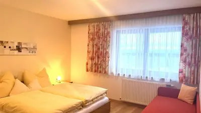 Ein Bett oder Betten in einem Zimmer der Unterkunft Haus Oberluggauer