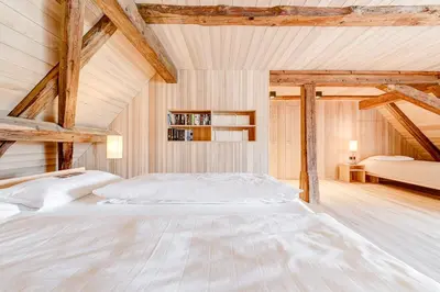 Ein Bett oder Betten in einem Zimmer der Unterkunft Propstei Sankt Gerold