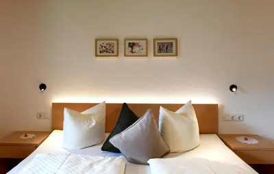 Ein Bett oder Betten in einem Zimmer der Unterkunft Ferienwohnung Lingg