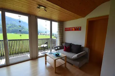 Ein Sitzbereich in der Unterkunft Apartment Magdalena