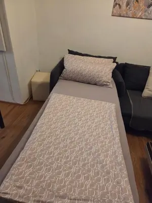 Ein Bett oder Betten in einem Zimmer der Unterkunft Ferienwohnung