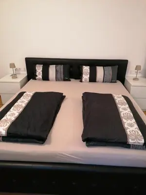 Ein Bett oder Betten in einem Zimmer der Unterkunft Ferienwohnung