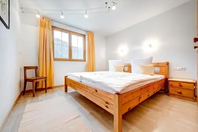 Ein Bett oder Betten in einem Zimmer der Unterkunft Dorfblick, Ferienwohnung