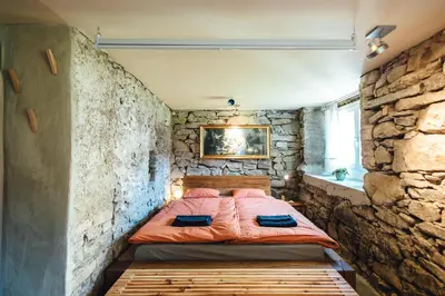 Ein Bett oder Betten in einem Zimmer der Unterkunft Willkommen im Rustico - Deinem Rückzugsort zwischen Bergen und Bodensee