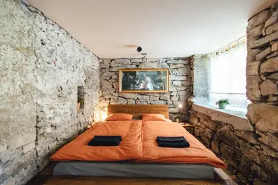 Ein Bett oder Betten in einem Zimmer der Unterkunft Willkommen im Rustico - Deinem Rückzugsort zwischen Bergen und Bodensee