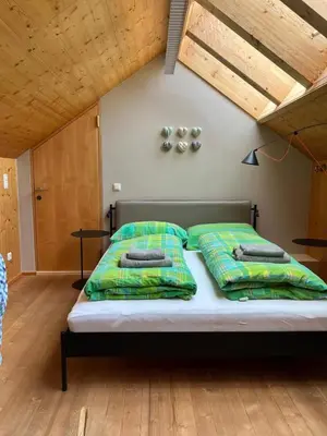 Ein Bett oder Betten in einem Zimmer der Unterkunft Villa Schaschl