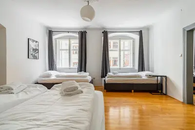 Ein Bett oder Betten in einem Zimmer der Unterkunft homy Downtown Elegance