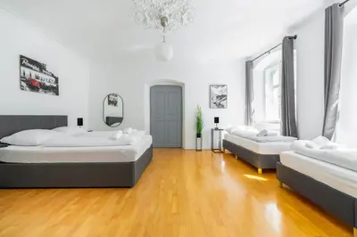 Ein Bett oder Betten in einem Zimmer der Unterkunft homy Downtown Elegance