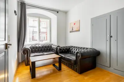 Ein Sitzbereich in der Unterkunft homy Downtown Elegance