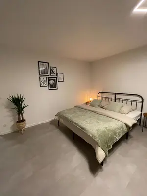 Ein Bett oder Betten in einem Zimmer der Unterkunft My Home