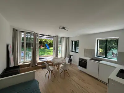 Ein Sitzbereich in der Unterkunft Gartenwohnung