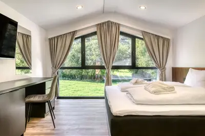 Ein Bett oder Betten in einem Zimmer der Unterkunft bsundrix Tiny Homes