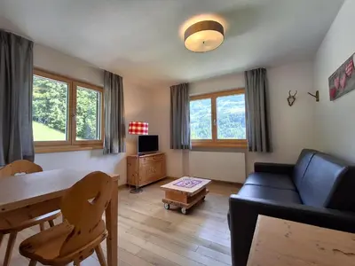 Ein Sitzbereich in der Unterkunft Ferienwohnung Almrausch by Alpenfeder