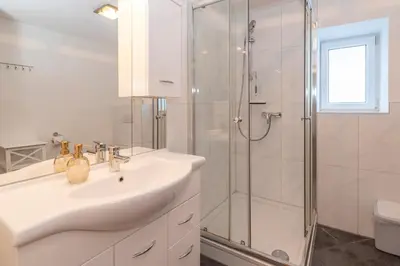 Ein Badezimmer in der Unterkunft Gästehaus Sahin 3 by Alpenfeder