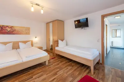 Ein Bett oder Betten in einem Zimmer der Unterkunft Sahin 4 by Alpenfeder