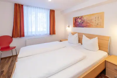 Ein Bett oder Betten in einem Zimmer der Unterkunft Sahin 5 by Alpenfeder