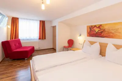Ein Bett oder Betten in einem Zimmer der Unterkunft Sahin 6 by Alpenfeder