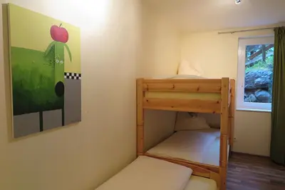 Ein Bett oder Betten in einem Zimmer der Unterkunft Alpina Central
