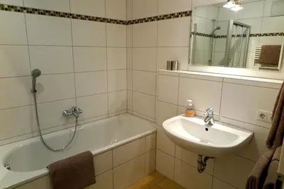 Ein Badezimmer in der Unterkunft Alpina Central