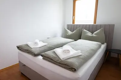 Ein Bett oder Betten in einem Zimmer der Unterkunft Riedwohnung 1- Lustenau