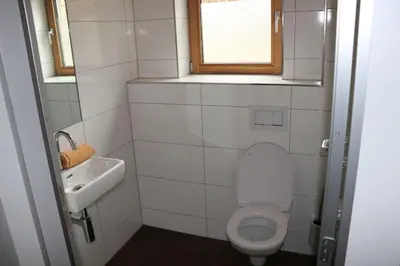 Ein Badezimmer in der Unterkunft Alpenvereinshaus