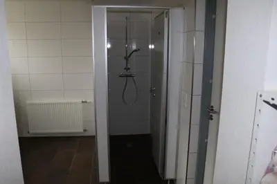 Ein Badezimmer in der Unterkunft Alpenvereinshaus