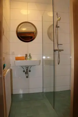 Ein Badezimmer in der Unterkunft Alpenvereinshaus