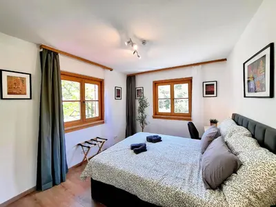 Ein Bett oder Betten in einem Zimmer der Unterkunft Lake Family and Group Apartments