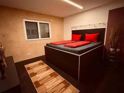 Ein Bett oder Betten in einem Zimmer der Unterkunft Loft 4-room