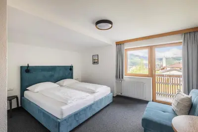 Ein Bett oder Betten in einem Zimmer der Unterkunft Rössle Appartement