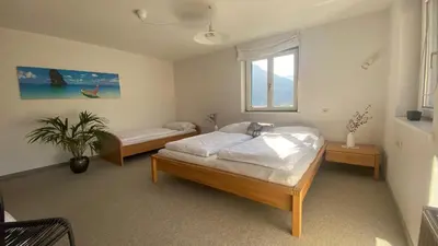 Ein Bett oder Betten in einem Zimmer der Unterkunft Haus Hirschlitten