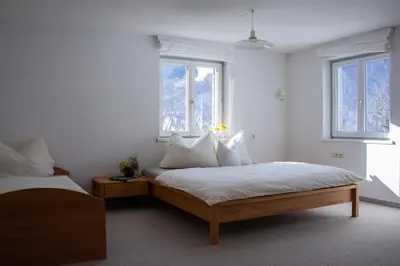 Ein Bett oder Betten in einem Zimmer der Unterkunft Haus Hirschlitten