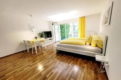Ein Bett oder Betten in einem Zimmer der Unterkunft Top2 Apartmenthaus Sonnenschein