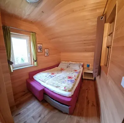 Ein Bett oder Betten in einem Zimmer der Unterkunft Ferienhaus Rain