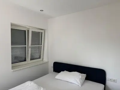 Ein Bett oder Betten in einem Zimmer der Unterkunft Bauern 65