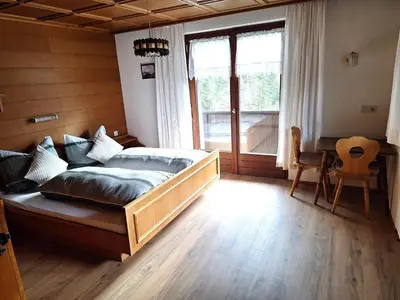 Ein Bett oder Betten in einem Zimmer der Unterkunft Ferienwohnung Rüf