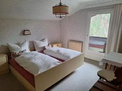 Ein Bett oder Betten in einem Zimmer der Unterkunft Ferienwohnung Rüf