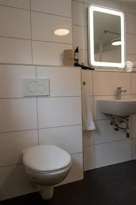 Ein Badezimmer in der Unterkunft Retro-Style in der Bregenzer Fussgängerzone