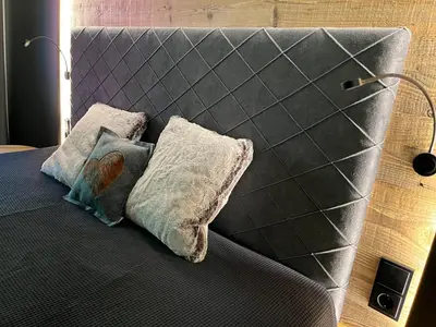 Ein Bett oder Betten in einem Zimmer der Unterkunft Bergtraum Aparthotel