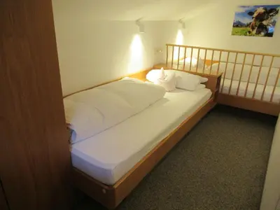 Ein Bett oder Betten in einem Zimmer der Unterkunft Bergfried