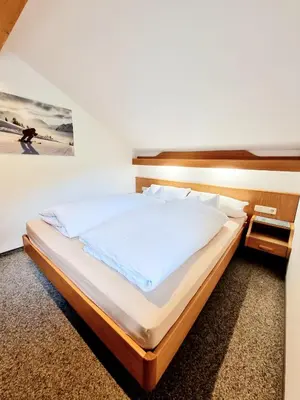 Ein Bett oder Betten in einem Zimmer der Unterkunft Bergfried
