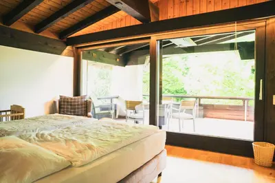 Ein Bett oder Betten in einem Zimmer der Unterkunft Villa Werdenberg