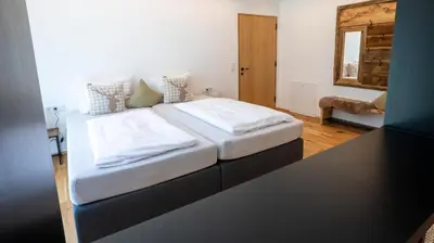 Ein Bett oder Betten in einem Zimmer der Unterkunft Ferienwohnung EMI
