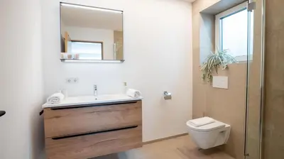 Ein Badezimmer in der Unterkunft Ferienwohnung EMI
