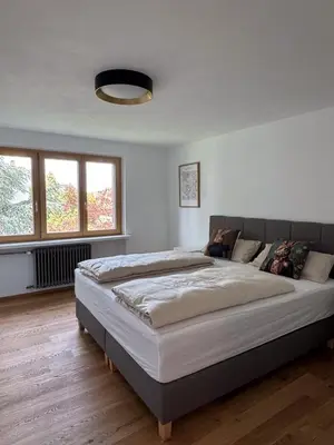 Ein Bett oder Betten in einem Zimmer der Unterkunft Bergblick & Dorfgefühl in Hörbranz