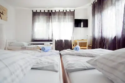Ein Bett oder Betten in einem Zimmer der Unterkunft Hostel Villa Viva