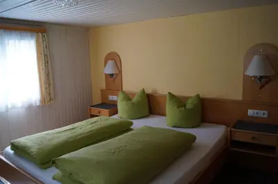 Ein Bett oder Betten in einem Zimmer der Unterkunft Ferienhaus Lila