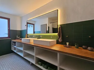 Ein Badezimmer in der Unterkunft Der Alpenfrieden