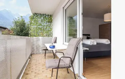 Ein Bett oder Betten in einem Zimmer der Unterkunft Ferienwohnung In Bludenz