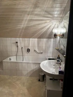 Ein Badezimmer in der Unterkunft Am 12er